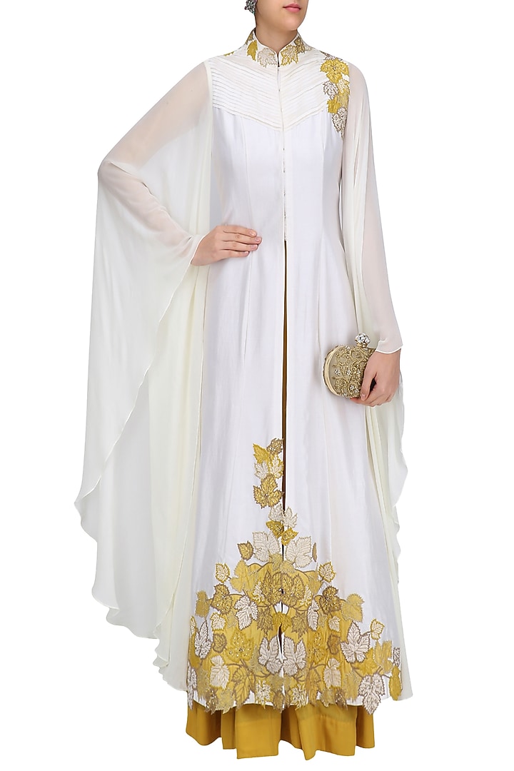 Ivory and mustard yellow anarkali with floral cutwork jacket available only at Pernia's Pop Up Shop.