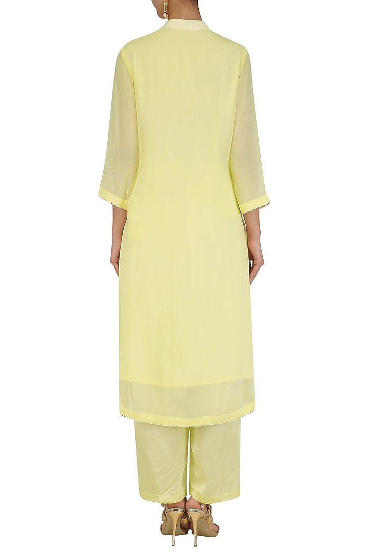 Lemon yellow thread and peral work straight kurta set available only at Pernia's Pop Up Shop.