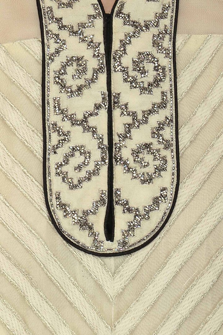 Beige and black thread and cutdana work anarkali setavailable only at Pernia's Pop Up Shop.