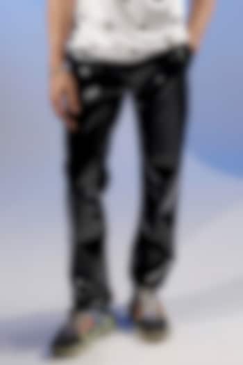 Black Coated Jersey Pant by Jubinav Chadha Men at Pernia's Pop Up Shop