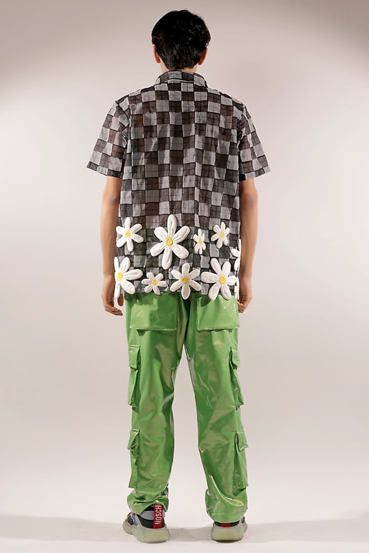 Green Rubber Coated Jersey Cargo Pants by Jubinav Chadha Men at Pernia's Pop Up Shop