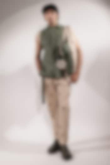 Green Leather Sleeveless Jacket by Jubinav Chadha Men at Pernia's Pop Up Shop