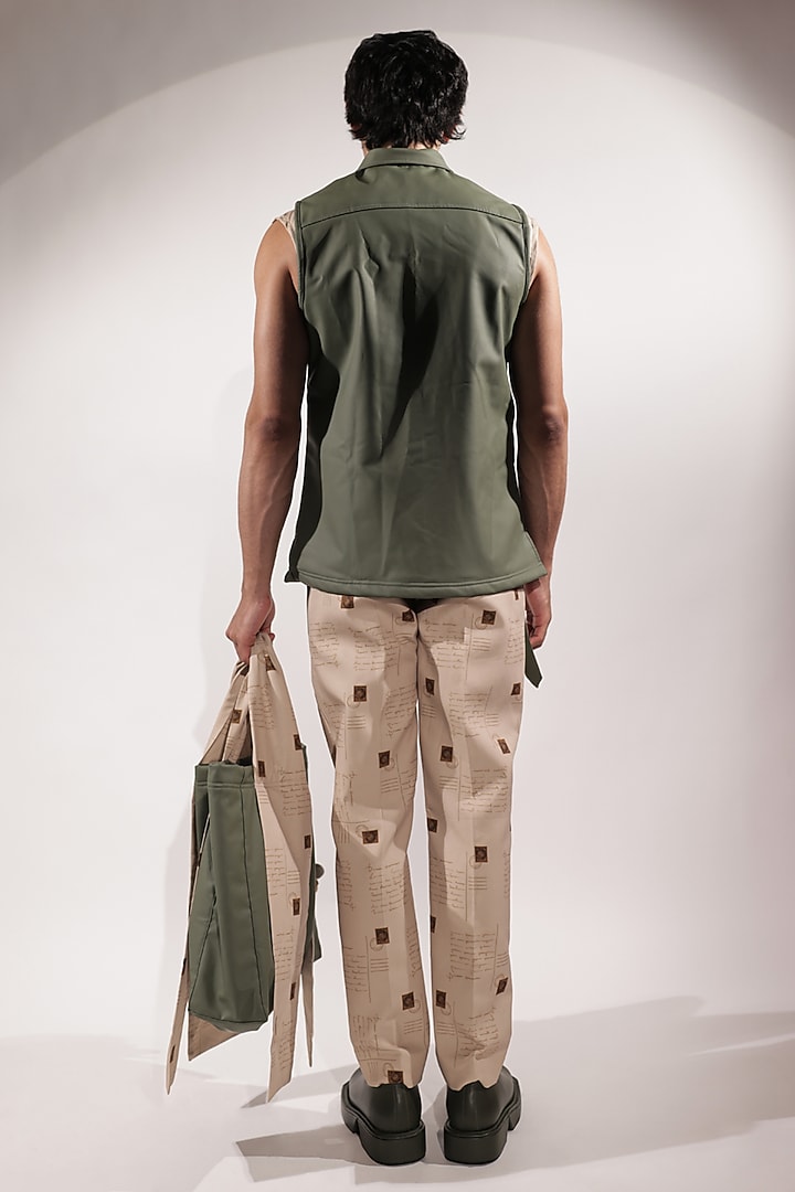 Green Leather Sleeveless Jacket by Jubinav Chadha Men at Pernia's Pop Up Shop