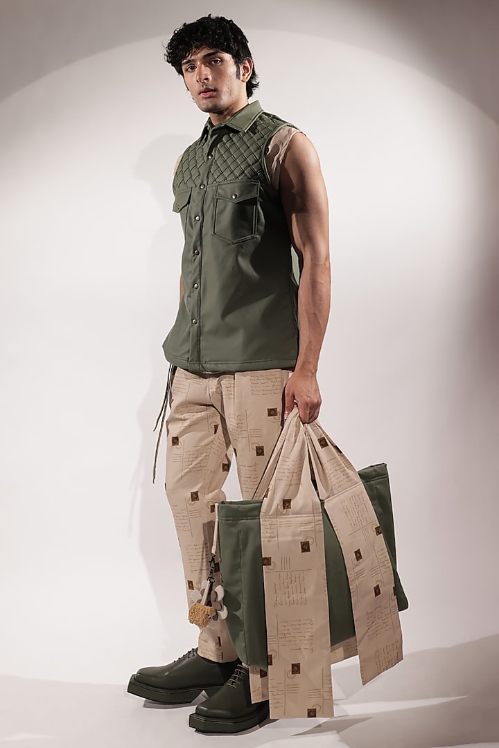 Green Leather Sleeveless Jacket by Jubinav Chadha Men at Pernia's Pop Up Shop