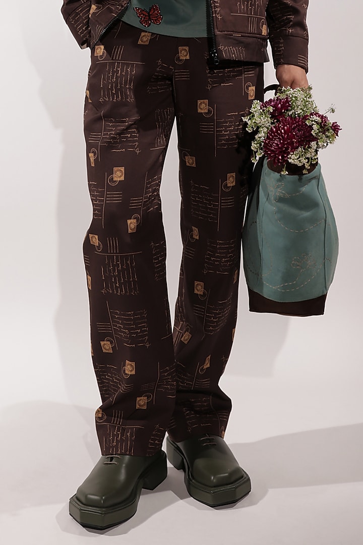 Brown Crepe Printed Pants by Jubinav Chadha Men at Pernia's Pop Up Shop