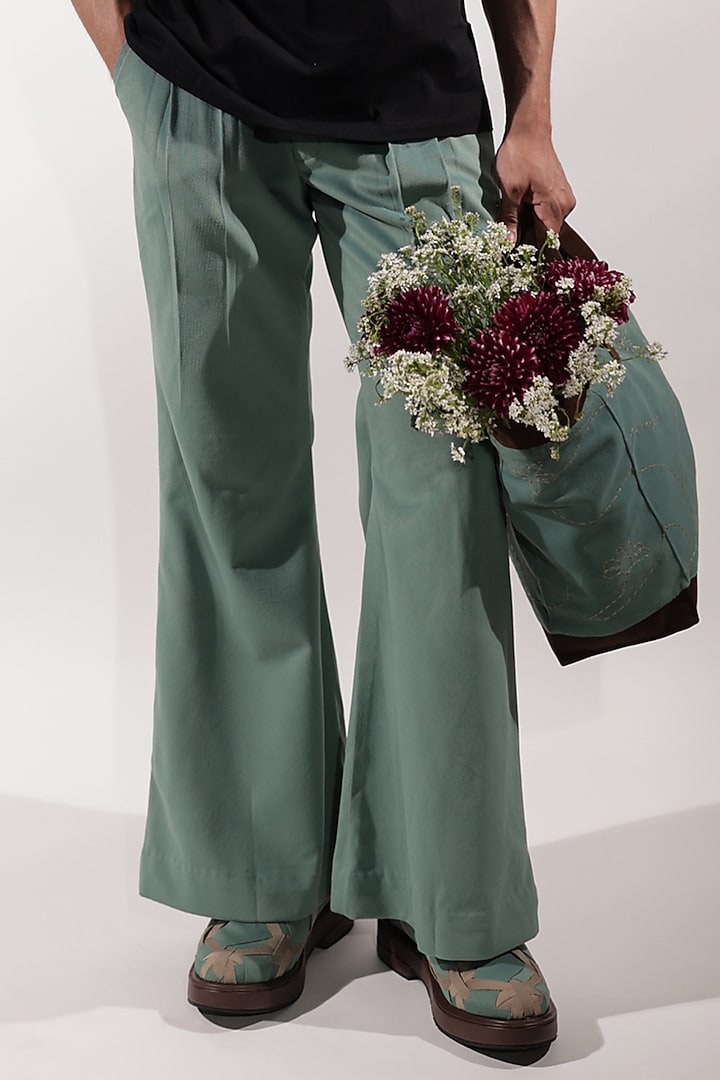 Jade Green Suede Bootcut Pants by Jubinav Chadha Men at Pernia's Pop Up Shop