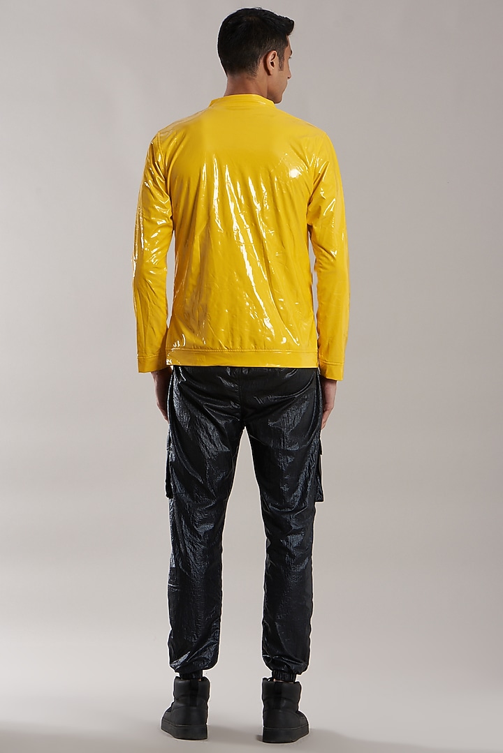 Yellow Rubber Coated Jersey Jacket by Jubinav Chadha Men at Pernia's Pop Up Shop