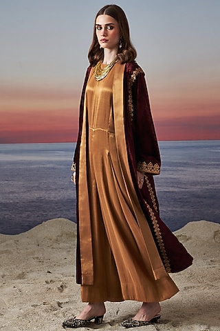 Gold Tissue Jumpsuit With Cape by JUGGNI
