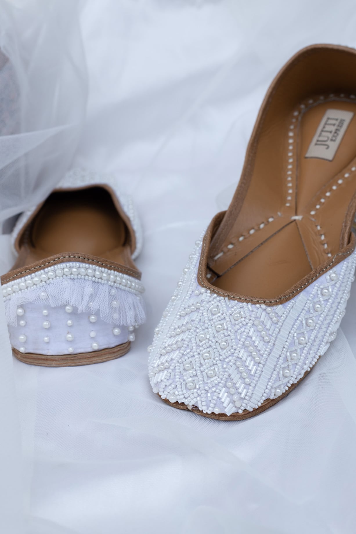 White Pearl Juttis by Jutti Express at Pernia's Pop Up Shop 2025
