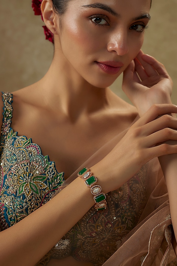 Gold Finish Uncut Polki & Doublet Emerald Stone Bracelet by JewelTreeTz at Pernia's Pop Up Shop