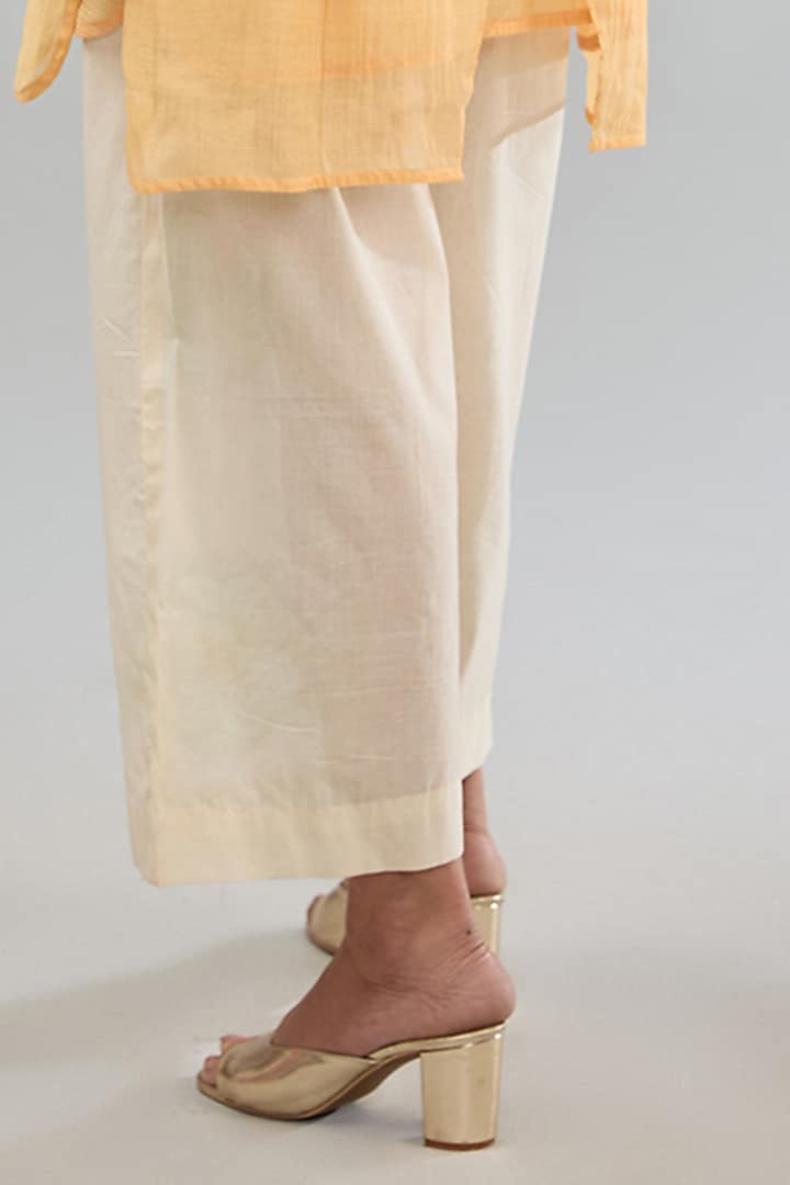 Off-White Cotton Machine Embroidered Straight Pants by Jyoti Bansal at Pernia's Pop Up Shop