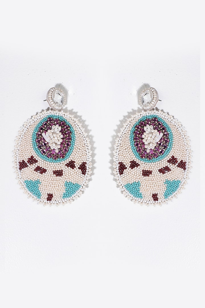 White Embroidered Dangler Earrings by Jyo Das Accessories at Pernia's Pop Up Shop