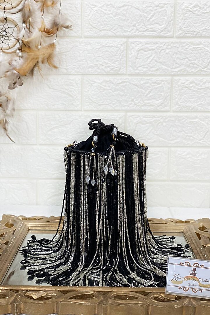 Black Sequins Embellished Potli by Kainiche by Mehak at Pernia's Pop Up Shop