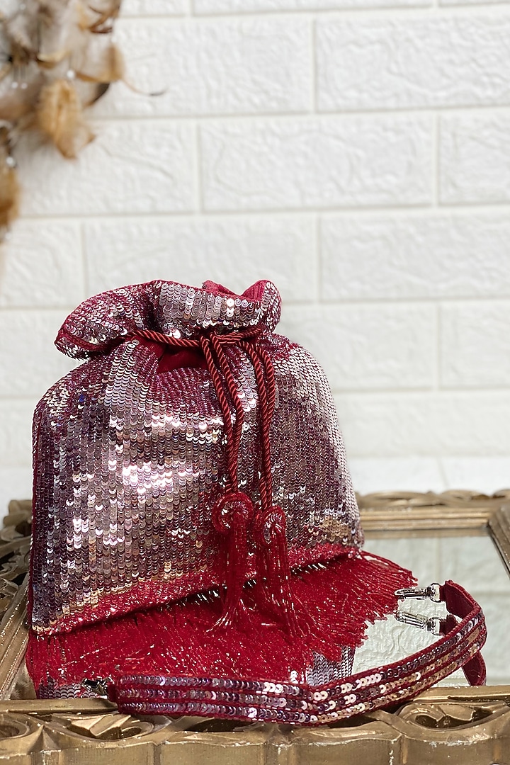 Maroon Sequins Embellished Potli by Kainiche by Mehak at Pernia's Pop Up Shop