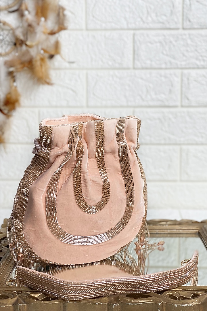 Rose Gold Sequins & Pearl Embellished Potli by Kainiche by Mehak at Pernia's Pop Up Shop