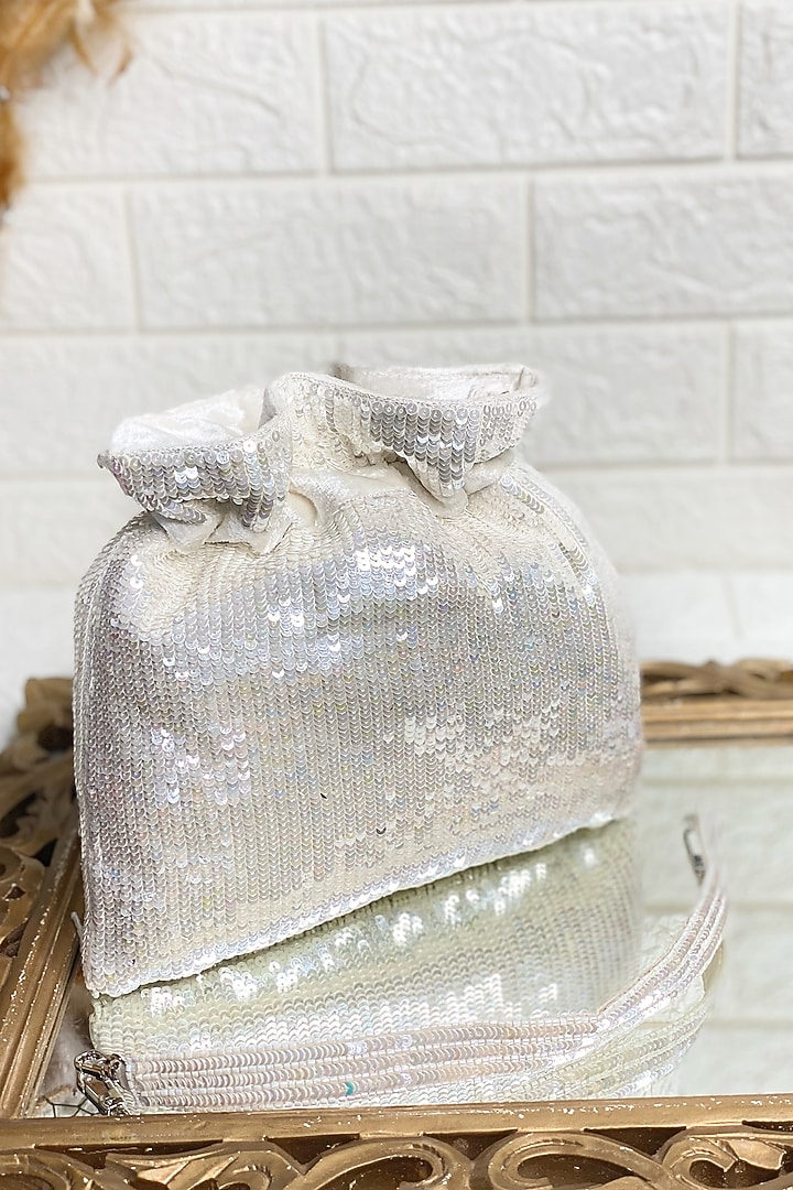 White Sequins Embellished Potli by Kainiche by Mehak at Pernia's Pop Up Shop