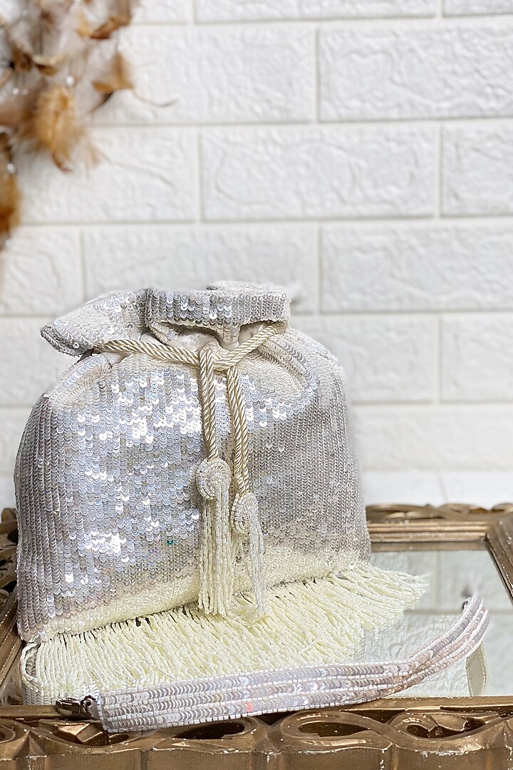 White Sequins Embellished Potli by Kainiche by Mehak at Pernia's Pop Up Shop