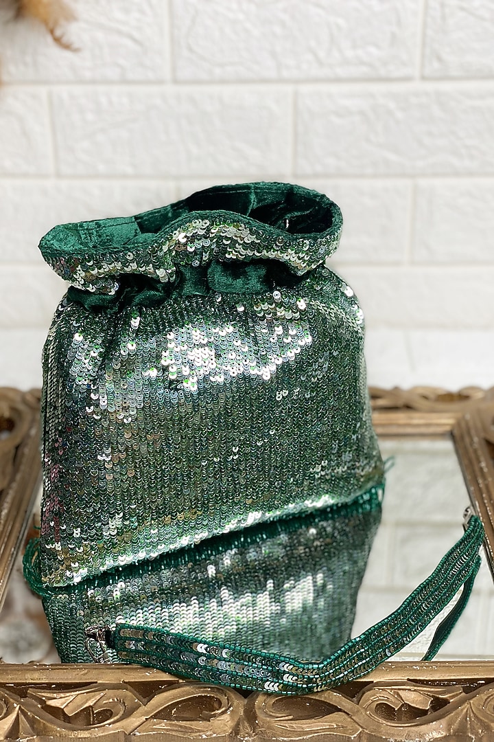 Bottle Green Sequins Embellished Potli by Kainiche by Mehak at Pernia's Pop Up Shop