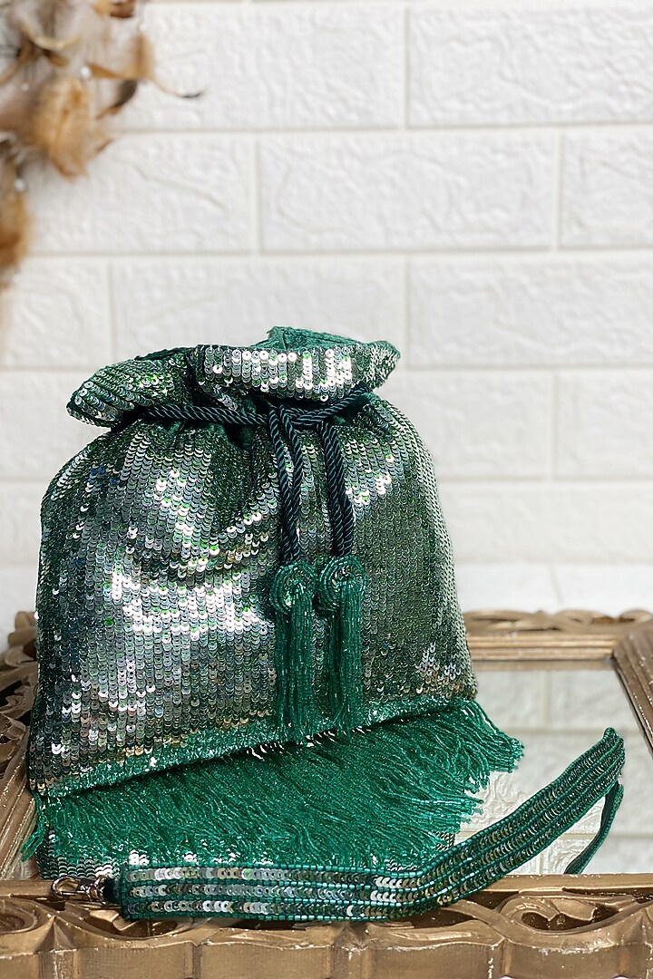 Bottle Green Sequins Embellished Potli by Kainiche by Mehak at Pernia's Pop Up Shop