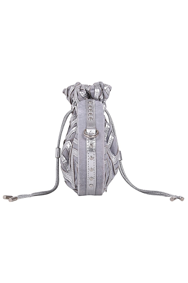 Silver Appliques Potli With Chain & Tassels by Kaeros at Pernia's Pop Up Shop