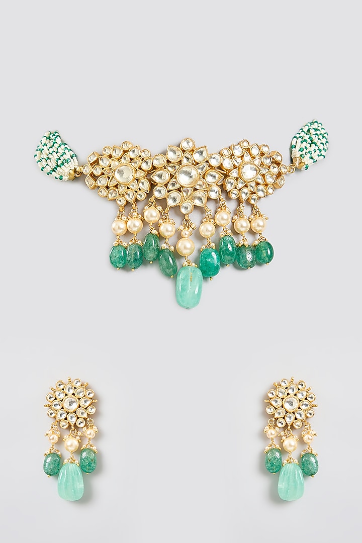 Gold Finish Floral Kundan Polki & Emerald Green Beaded Choker Necklace Set In Sterling Silver by Kiara Luxe at Pernia's Pop Up Shop