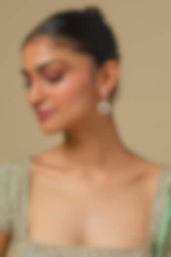 Gold Finish Kundan Polki & Emerald Stone Dangler Earrings In Sterling Silver by Kiara Luxe at Pernia's Pop Up Shop