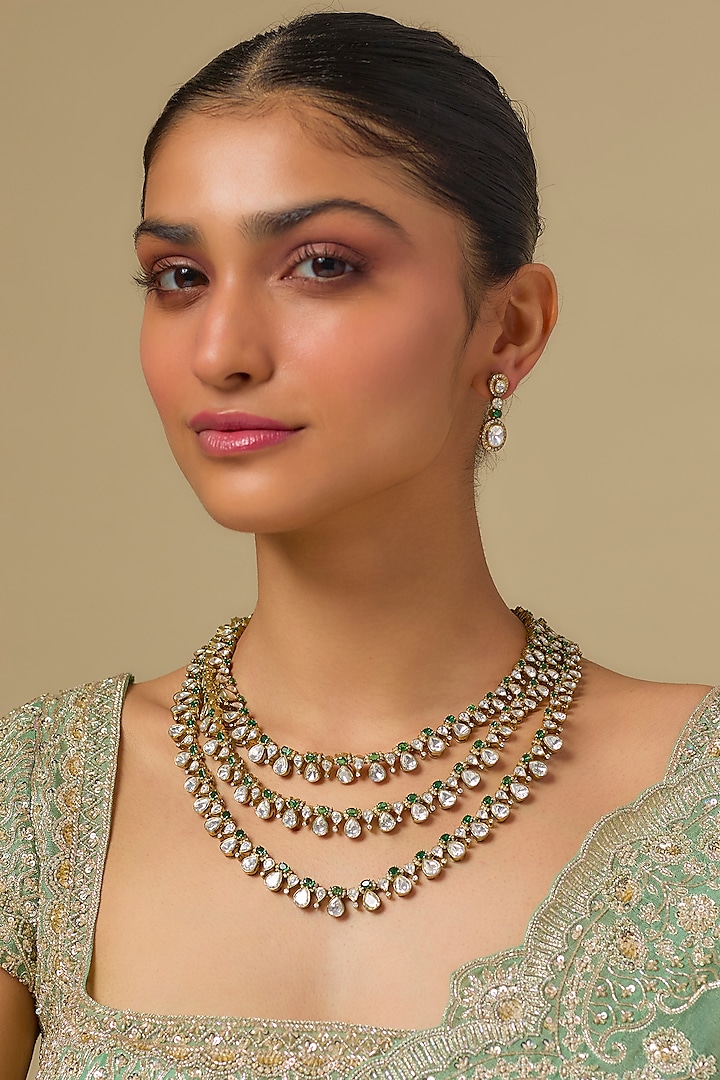 Gold Finish Kundan Polki Layered Necklace Set In Sterling Silver by Kiara Luxe at Pernia's Pop Up Shop