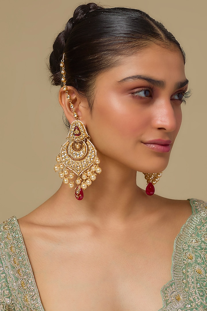 Gold Finish Kundan Polki & Ruby Stone Chandbali Earrings In Sterling Silver by Kiara Luxe at Pernia's Pop Up Shop