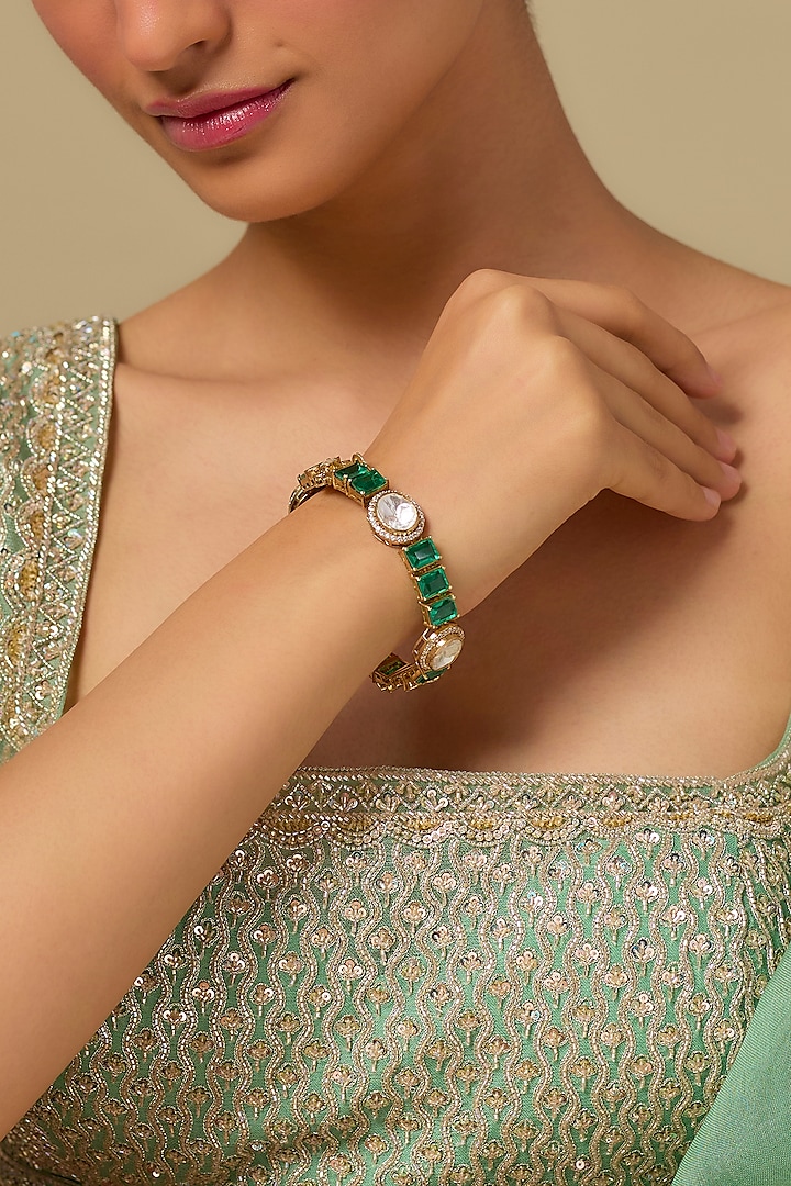 Gold Finish Kundan Polki & Emerald Stone Bracelet In Sterling Silver by Kiara at Pernia's Pop Up Shop