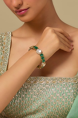 Gold Finish Kundan Polki & Emerald Stone Bracelet In Sterling Silver by Kiara Luxe
