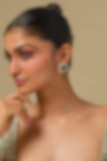 Gold Finish Kundan Polki & Green Stone Stud Earrings In Sterling Silver by Kiara at Pernia's Pop Up Shop