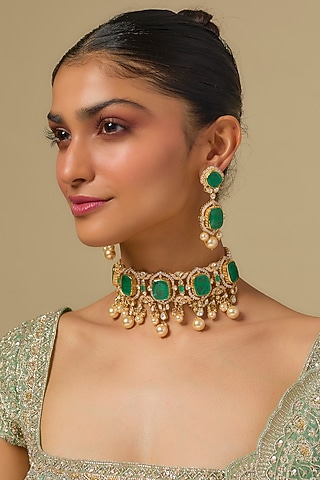 Gold Finish Kundan Polki & Emerald Stone Choker Necklace Set In Sterling Silver by Kiara Luxe