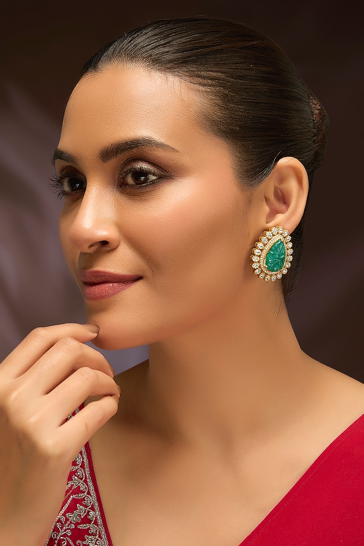 Gold Finish Moissanite Polki & Green Beryl Stone Meenakari Stud Earrings In Sterling Silver by Kiara Luxe at Pernia's Pop Up Shop