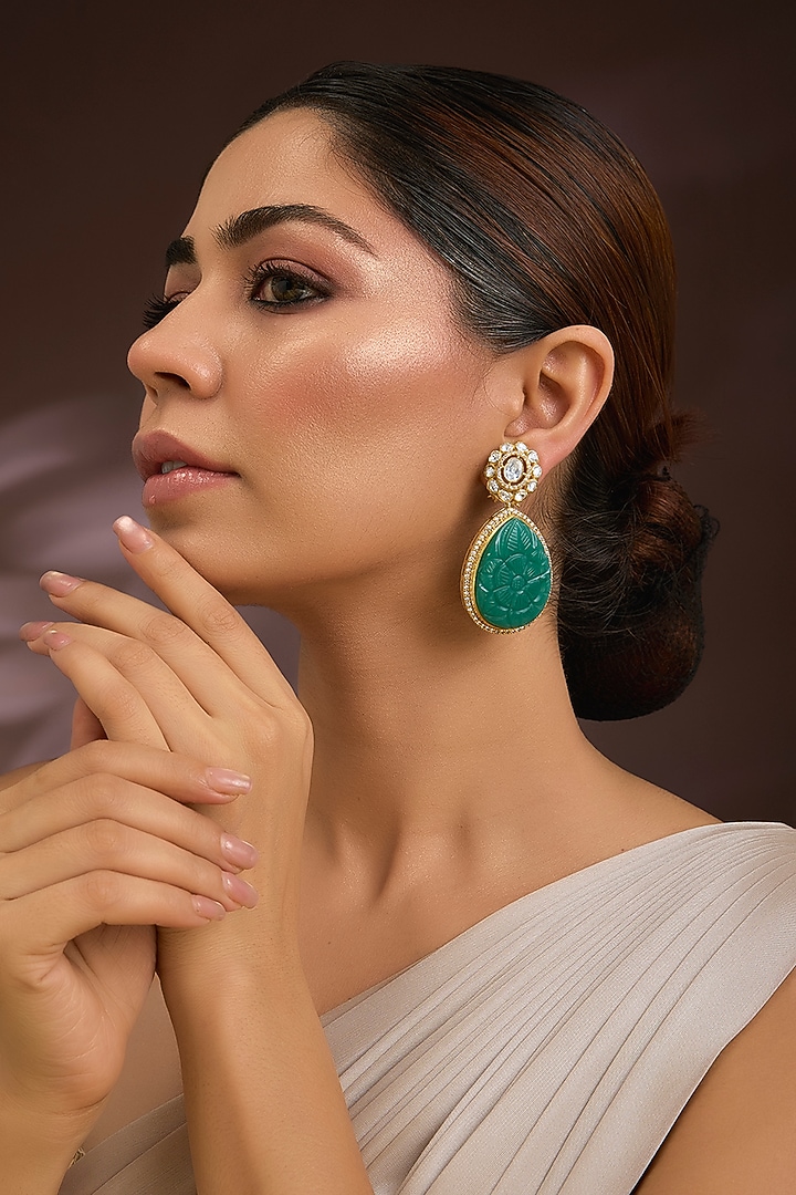 Gold Finish Moissanite Polki & Teardrop Emerald Stone Stud Earrings In Sterling Silver by Kiara Luxe at Pernia's Pop Up Shop