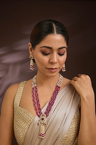 Gold Finish Kundan Polki & Ruby Beaded Layered Necklace Set In Sterling Silver by Kiara Luxe