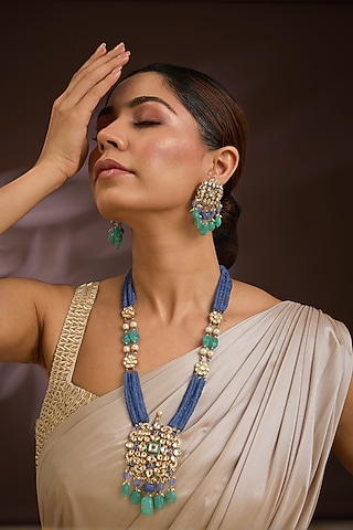 Gold Finish Kundan Polki & Blue Tanzanite Beaded Long Necklace Set In Sterling Silver by Kiara Luxe