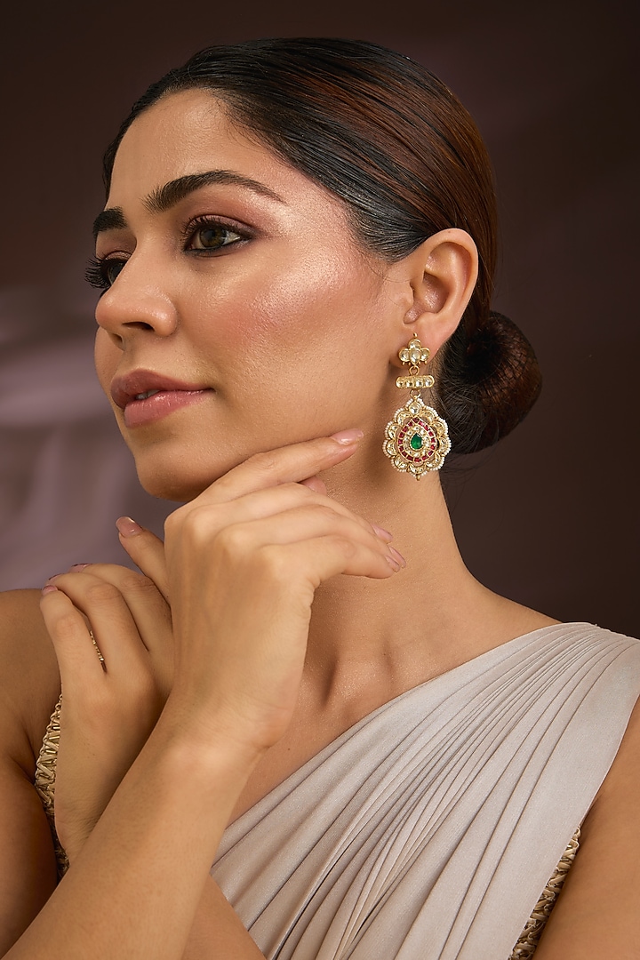 Gold Finish Kundan Polki & Emerald Stone Meenakari Enameled Chandbali Earrings In Sterling Silver by Kiara Luxe at Pernia's Pop Up Shop