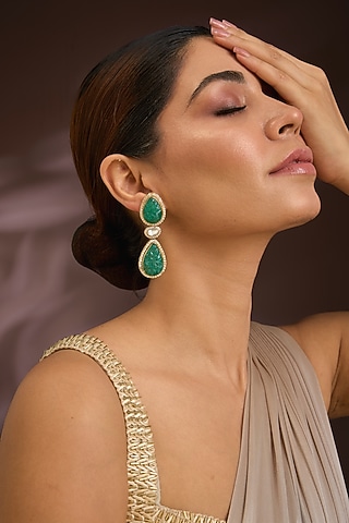 Gold Finish Moissanite Polki & Emerald Stone Dangler Earrings In Sterling Silver by Kiara Luxe
