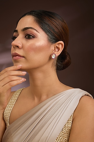 Gold Finish Kundan Polki & Ruby Gemstone Stud Earrings In Sterling Silver by Kiara Luxe