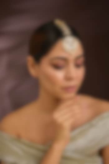 Gold Finish Kundan Polki & Pearl Crescent-Shaped Maangtikka In Sterling Silver by Kiara Luxe at Pernia's Pop Up Shop