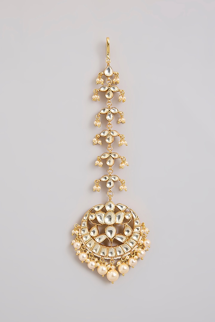 Gold Finish Kundan Polki & Pearl Crescent-Shaped Maangtikka In Sterling Silver by Kiara Luxe at Pernia's Pop Up Shop