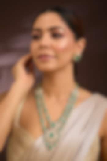 Gold Finish Moissanite Polki & Emerald Green Gemstone Layered Necklace Set In Sterling Silver by Kiara Luxe at Pernia's Pop Up Shop
