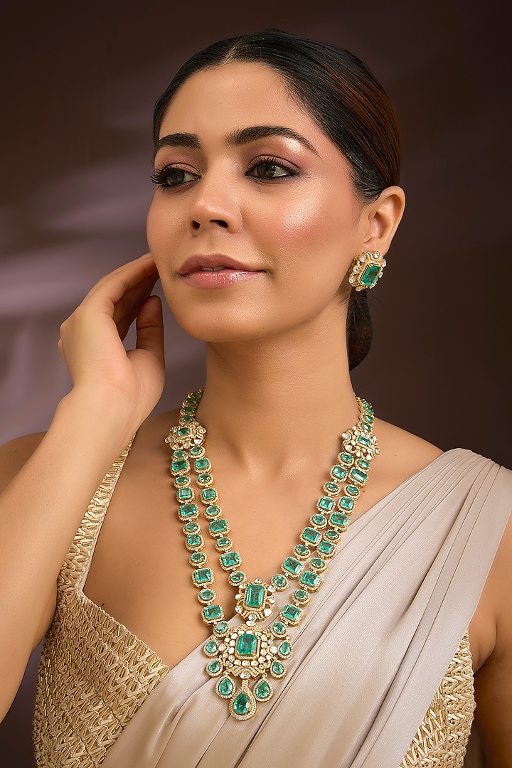 Gold Finish Moissanite Polki & Emerald Green Gemstone Layered Necklace Set In Sterling Silver by Kiara Luxe at Pernia's Pop Up Shop