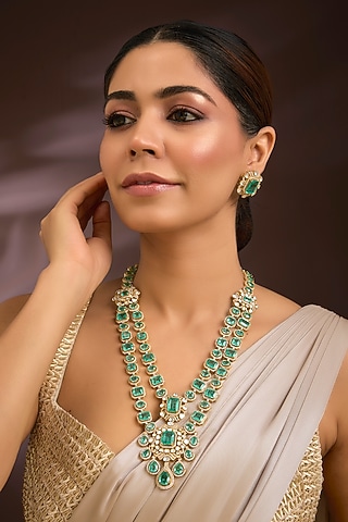 Gold Finish Moissanite Polki & Emerald Green Gemstone Layered Necklace Set In Sterling Silver by Kiara Luxe