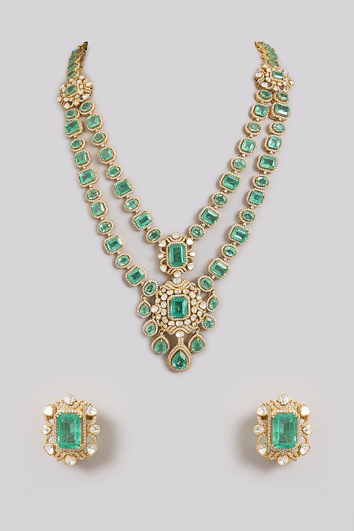 Gold Finish Moissanite Polki & Emerald Green Gemstone Layered Necklace Set In Sterling Silver by Kiara Luxe at Pernia's Pop Up Shop