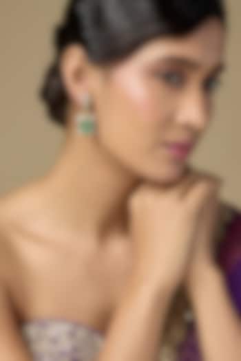 Gold Finish Kundan Polki & Oval-Cut Emerald Stone Dangler Earrings In Sterling Silver by Kiara Luxe at Pernia's Pop Up Shop