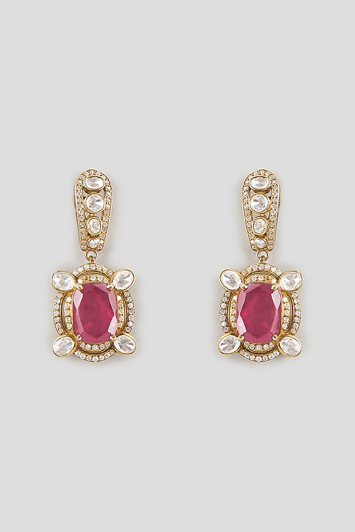 Gold Finish Kundan Polki & Oval-Cut Ruby Stone Dangler Earrings In Sterling Silver by Kiara Luxe at Pernia's Pop Up Shop