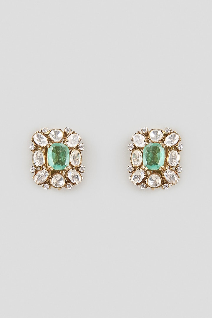 Gold Finish Kundan Polki & Emerald Stone Stud Earrings In Sterling Silver by Kiara Luxe at Pernia's Pop Up Shop