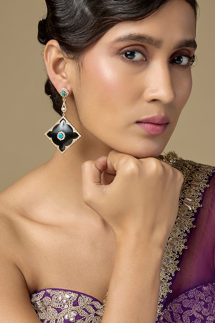 Gold Finish Kundan Polki & Black Onyx Dangler Earrings In Sterling Silver by Kiara Luxe at Pernia's Pop Up Shop