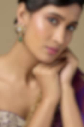Gold Finish Kundan Polki & Teardrop Emerald Dangler Earrings In Sterling Silver by Kiara Luxe at Pernia's Pop Up Shop